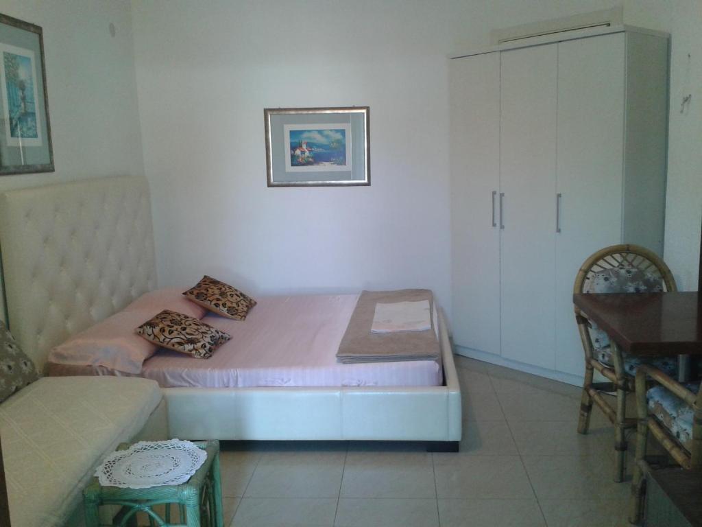 Collins Apartments Pula Room photo